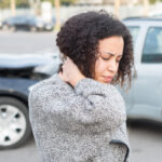 woman experiencing car accident symptoms woman experiencing car accident symptoms